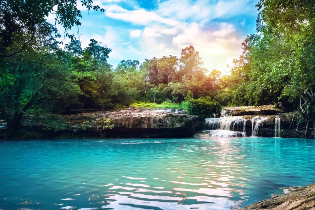 Stunning Waterhole in tropical Queensland with a waterfall - Websites For NDIS Providers - NDIS Provider Marketing