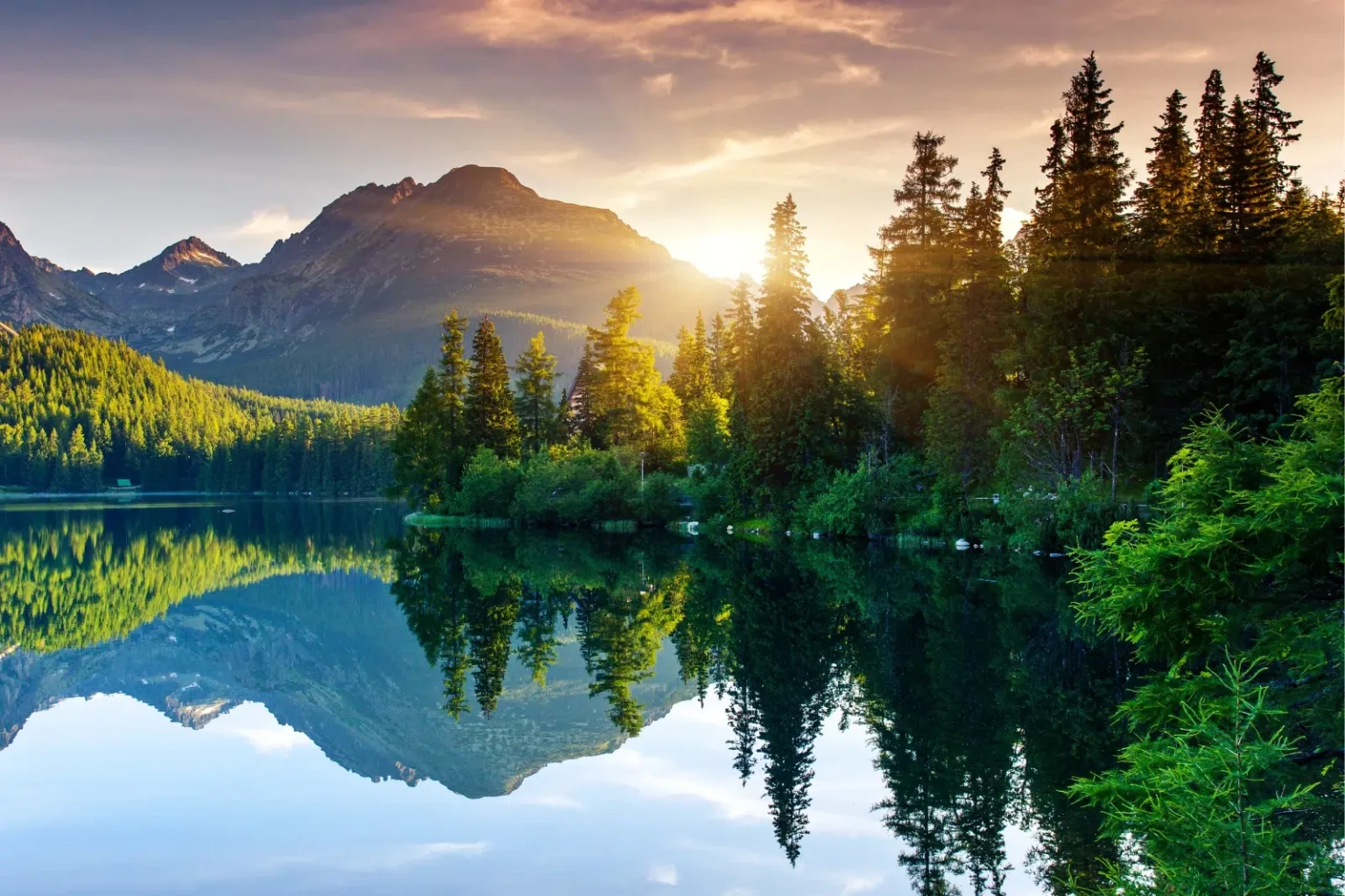 Stunning Sunrise over the mountains and lake. NDIS AI Tools to help NDIS Providers save time and be more organised.