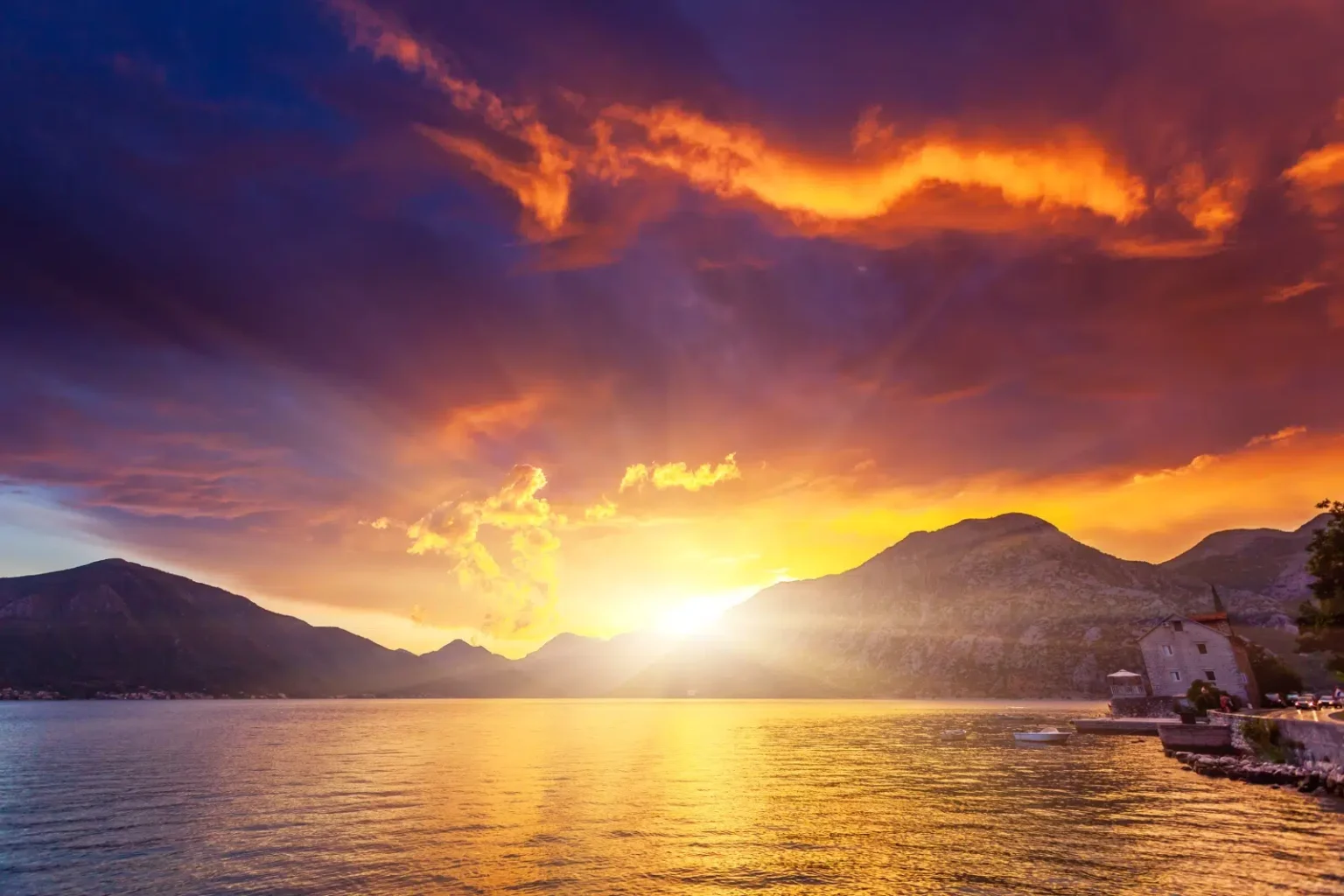 Sunsetsun over the mountains and a lake. Be in front of NDIS Participants when they are searching for support services with Advanced NDIS PPC that works!